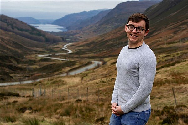 Headhshot of Cllr Patrick Logue