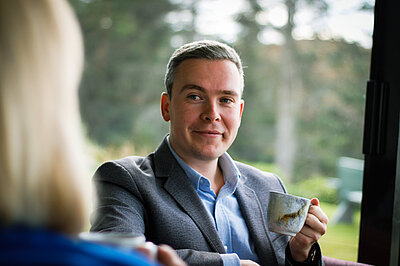 David speaking with a voter